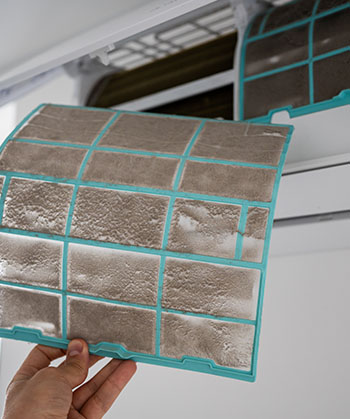 Service image 2 Template_0001_dirty-air-conditioner-filter-being-replaced-indoor-2026-03-19-23-36-44-utc