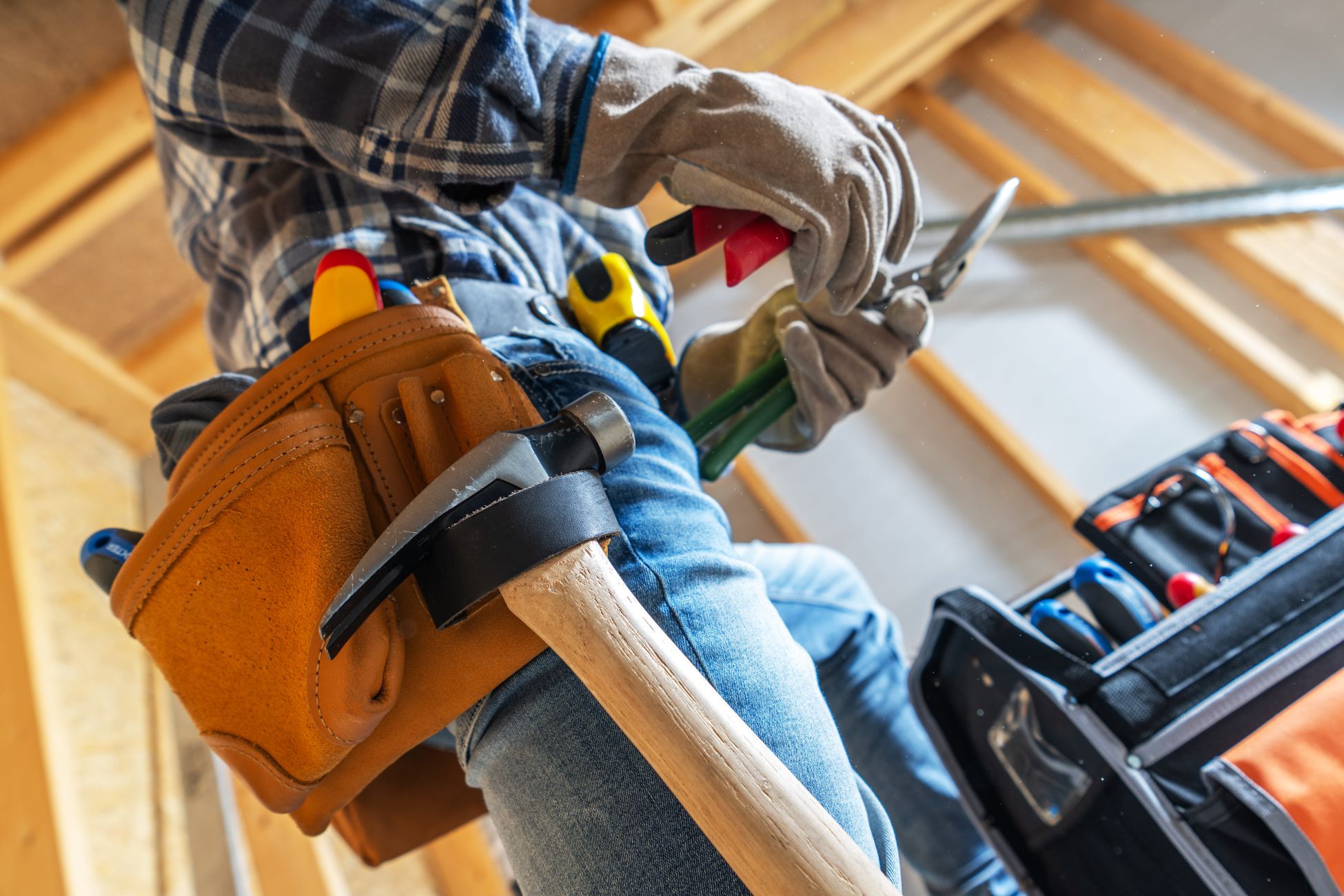 resized-construction-worker-repairs-wood-framing-in-a-buil